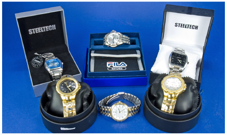 Appraisal: Four Various Boxed Watches plus Pierre Cardin unboxed and boxed