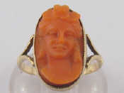 Appraisal: A carved coral cameo ring the cameo approx x mm