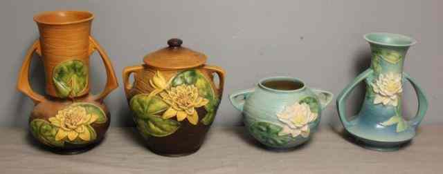 Appraisal: Piece Roseville Art Pottery Lot Includes an orange Roseville Water