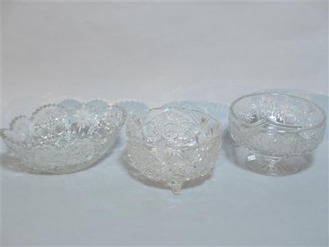 Appraisal: THREE CUT GLASS BOWLS Including one oval with scalloped sawtooth