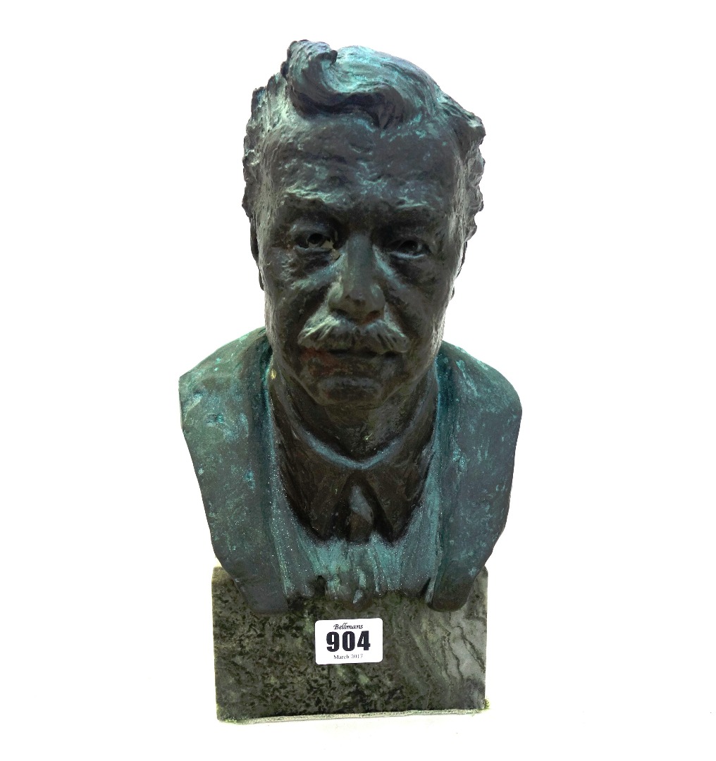 Appraisal: A patinated bronze bust th century depicting a moustached gentleman