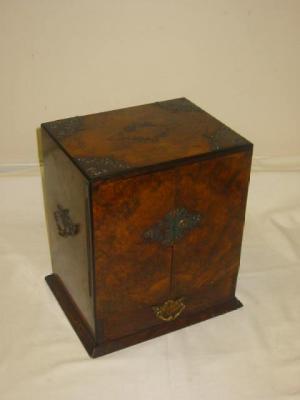 Appraisal: A VICTORIAN BURR WALNUT SMOKERS TABLE CABINET of oblong form