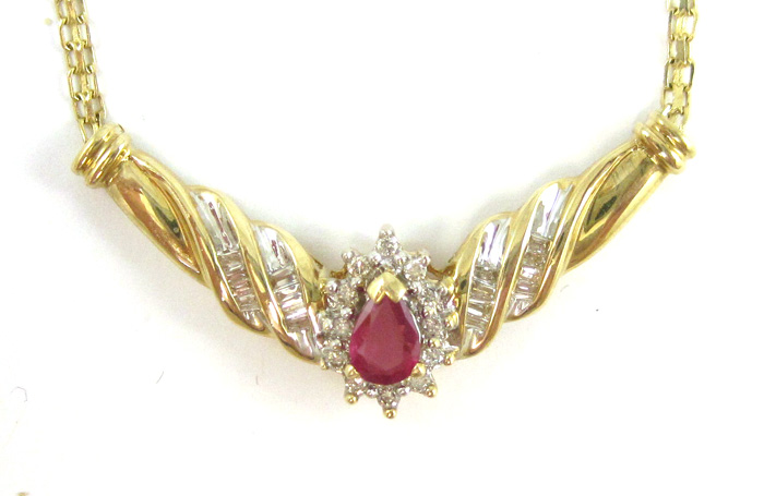 Appraisal: RUBY DIAMOND AND FOURTEEN KARAT GOLD NECKLACE the pendant secured