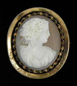 Appraisal: Another Victorian Cameo Pin Gold-filled engraved frame surrounds a twist