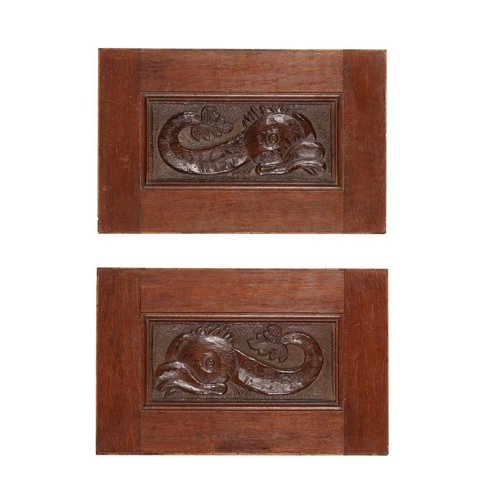 Appraisal: PAIR OF CARVED OAK PANELS OF DOLPHINS MID TH CENTURY