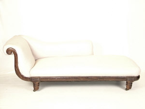 Appraisal: A Victorian rosewood chaise longue circa with calico upholstered rolling