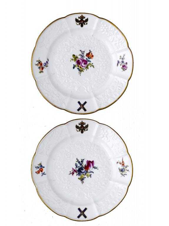 Appraisal: A PAIR OF MEISSEN ARMORIAL PLATES moulded with Gotzkowsky 'Erhabene