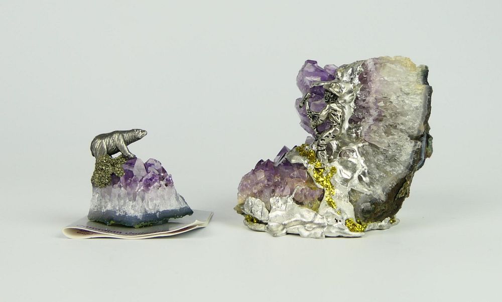 Appraisal: ROMI WOLF CANADIAN AMETHYST WITH SILVER MINER Raw amethyst stone