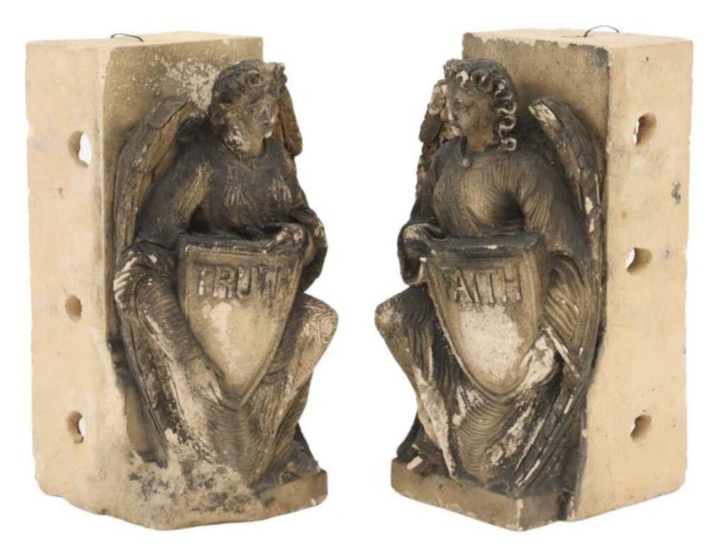 Appraisal: pair Cast composite angels holding shields late th c Faith