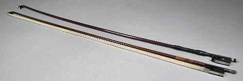 Appraisal: An E L Herrmann violin bow with octagonal shaft and