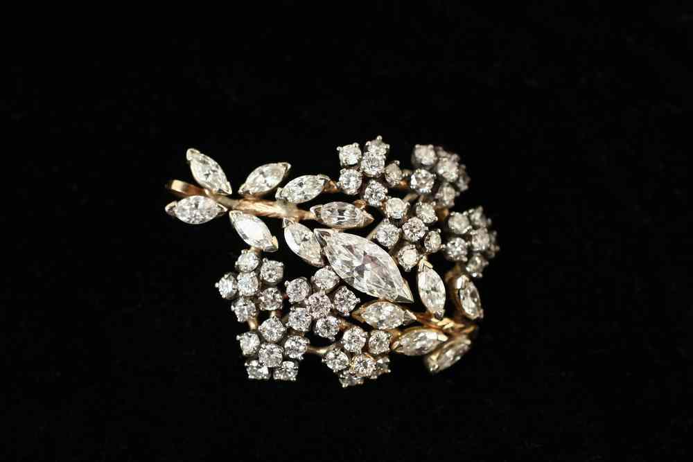 Appraisal: BROOCH - One K white and yellow gold brooch pendant