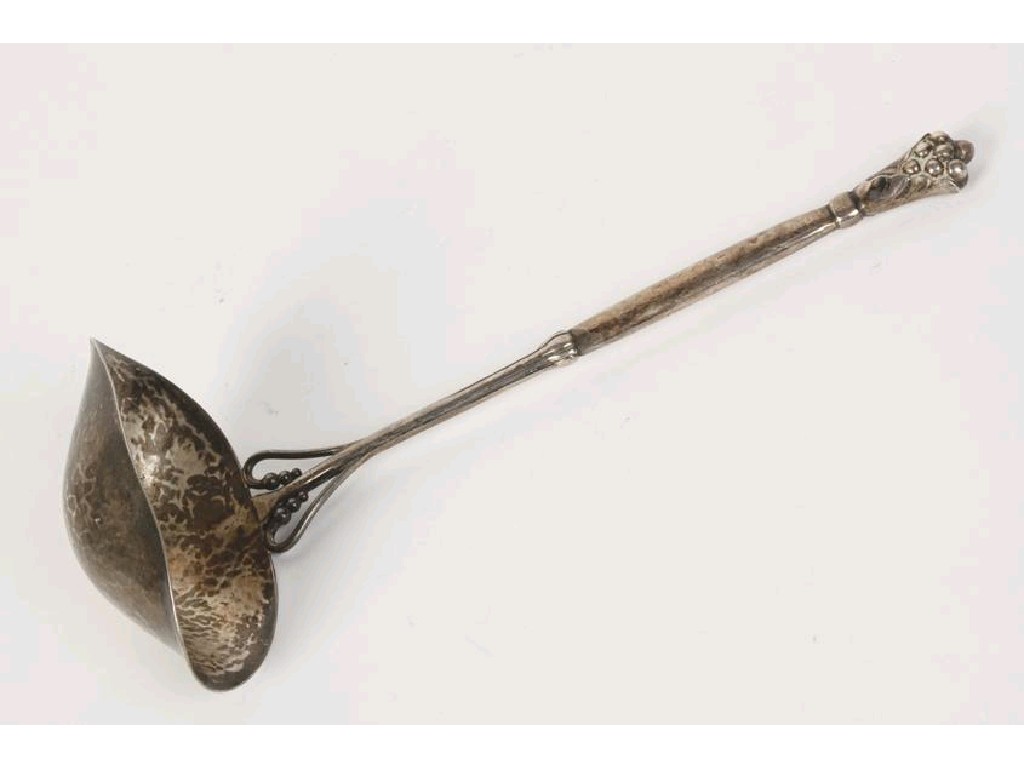 Appraisal: GEORG JENSEN A SILVER LADLE with a spot hammered double