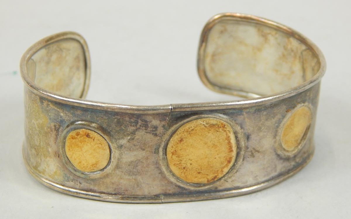 Appraisal: A cuff bracelet in white and yellow metal