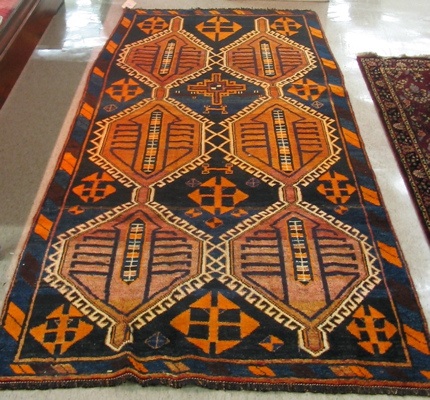 Appraisal: PERSIAN SHIRAZ ENTRY CARPET overall geometric design in shades of