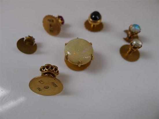 Appraisal: A COLLECTION OF GEM SET SHIRT STUDS IN CT GOLD