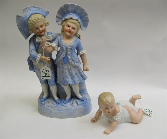 Appraisal: TWO BISQUE FIGURES one a young boy and young girl