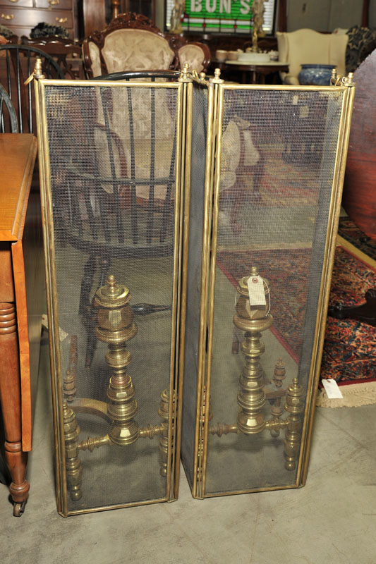 Appraisal: TWO FIREPLACE PIECES A pair of turned and paneled brass