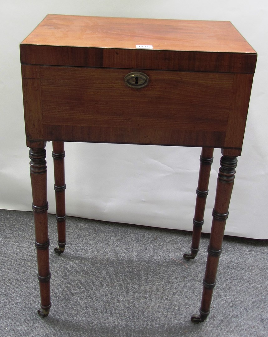 Appraisal: A th century rectangular mahogany teapoy with fitted interior on