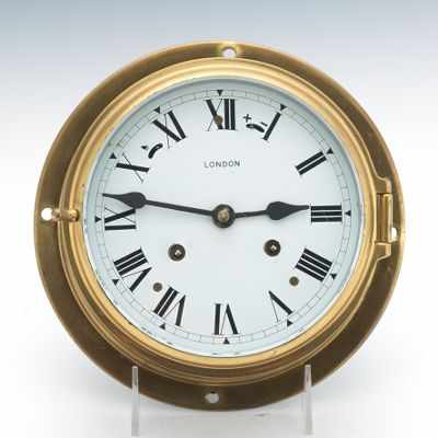 Appraisal: A London Ships Bell clock Time and strike strikes and