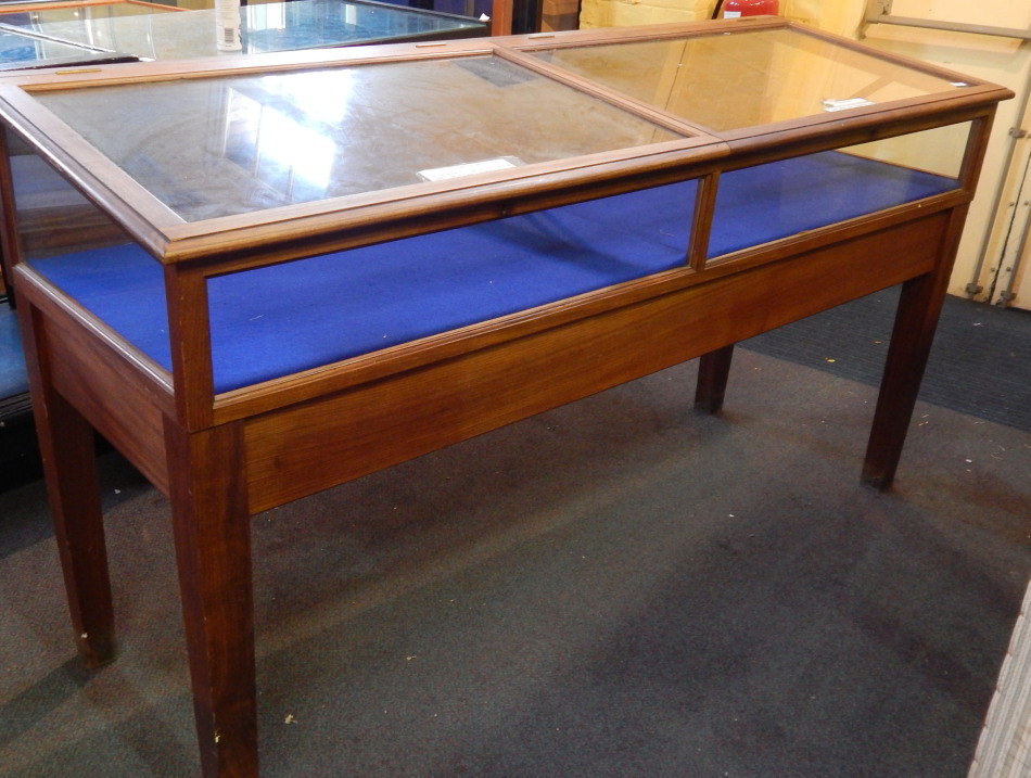 Appraisal: A thC teak mahogany museum type cabinet with two glazed