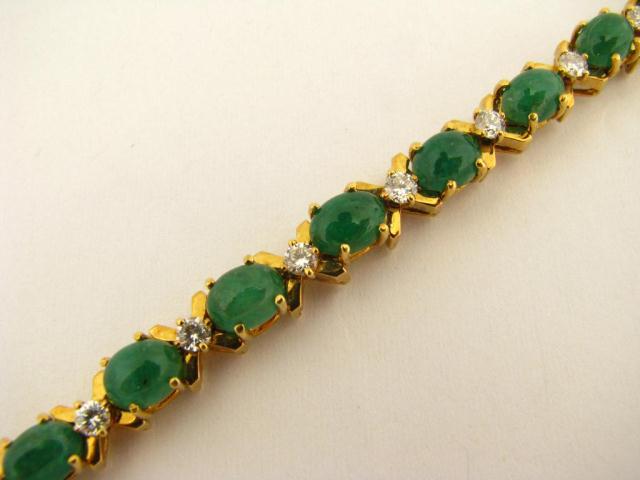 Appraisal: K Yellow Gold La Triomphe Bracelet with sixteen oval emeralds