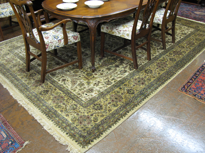 Appraisal: HAND KNOTTED ORIENTAL CARPET Indo-Persian overall scrolling floral raceme decoration