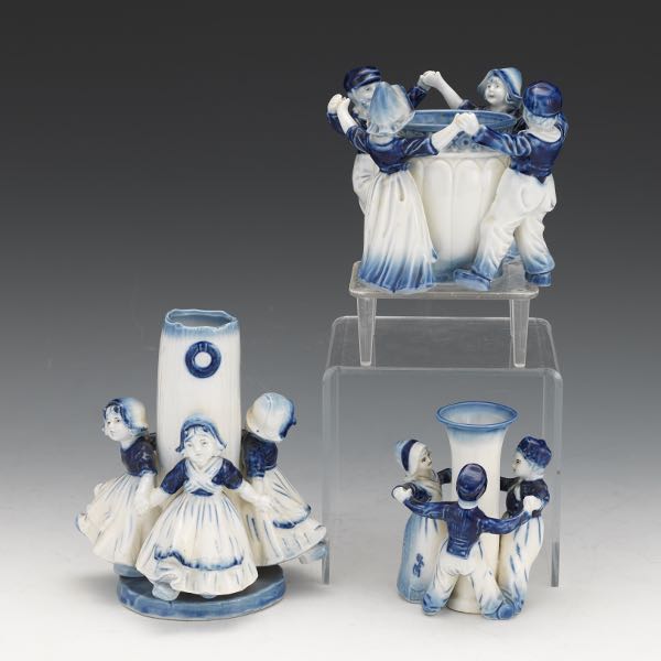 Appraisal: SET OF THREE DELFT FIGURAL VASES Set of three blue