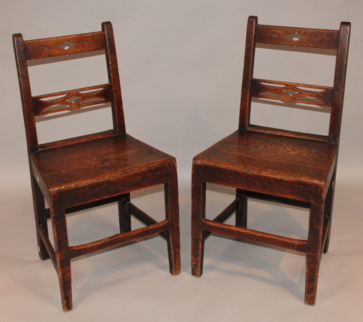 Appraisal: A pair of early thC oak dining chairs each with