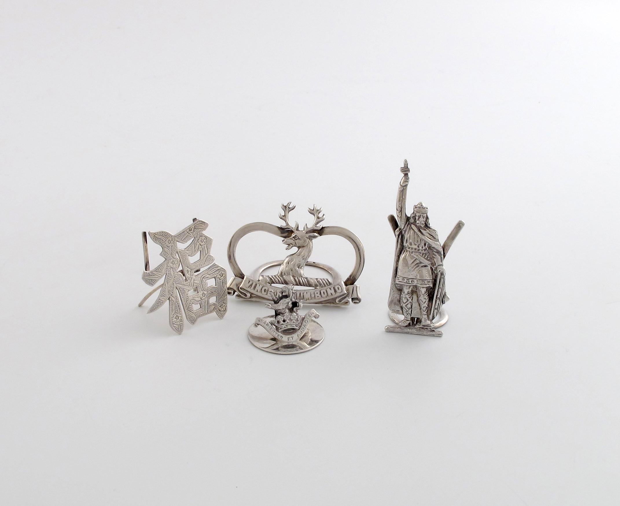 Appraisal: A mixed lot of silver menu card holders