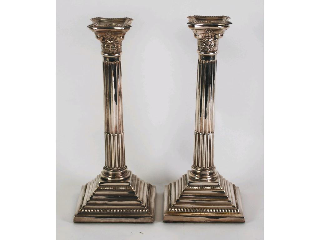 Appraisal: PAIR OF GEORGIAN STYLE SILVER CORINTHIAN COLUMN TABLE CANDLESTICKS with