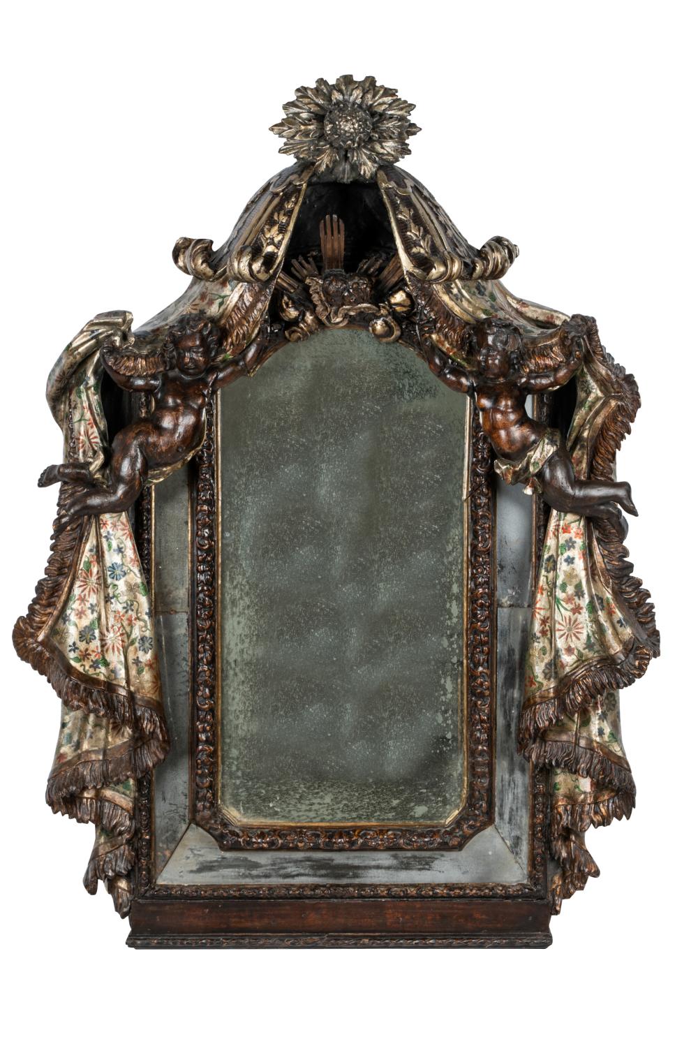 Appraisal: CONTINENTAL PAINTED CARVED WOOD MIRRORcrested by two putti supporting a