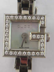 Appraisal: A lady's diamond set stainless steel Gucci wristwatch case approx