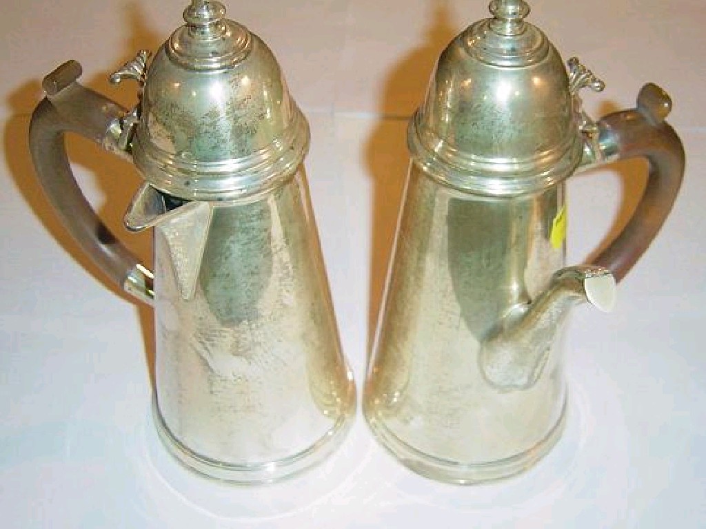 Appraisal: A cased silver cup saucer and spoon with hammered decoration