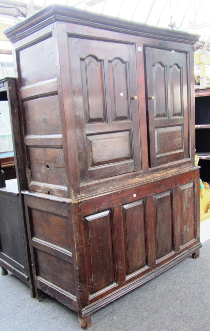 Appraisal: A th th century oak bacon cupboard with panel decoration