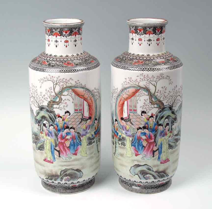 Appraisal: PAIR CHINESE MIRROR IMAGE VASES Cylindrical form polychrome images of