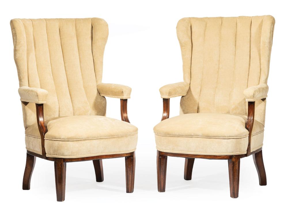 Appraisal: Pair of Continental Upholstered Fruitwood Armchairs channeled tall back padded