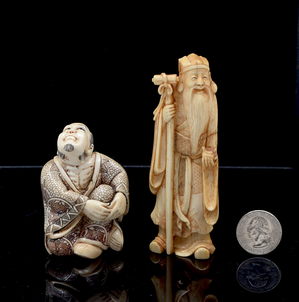 Appraisal: CARVED JAPANESE IVORY OKIMONOS Comprising - Standing elder with scroll