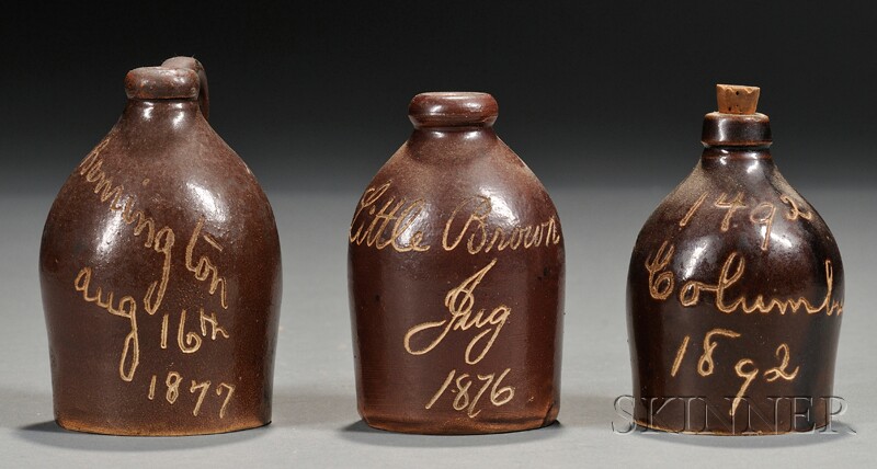 Appraisal: Three Miniature Souvenir Stoneware Jugs America late th century one