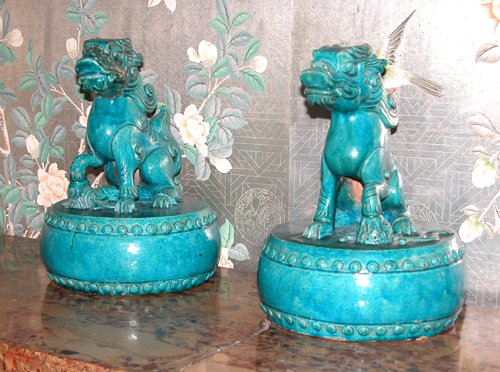 Appraisal: Title Pair of Oriental Ceramic Fu Dogs on Drums with