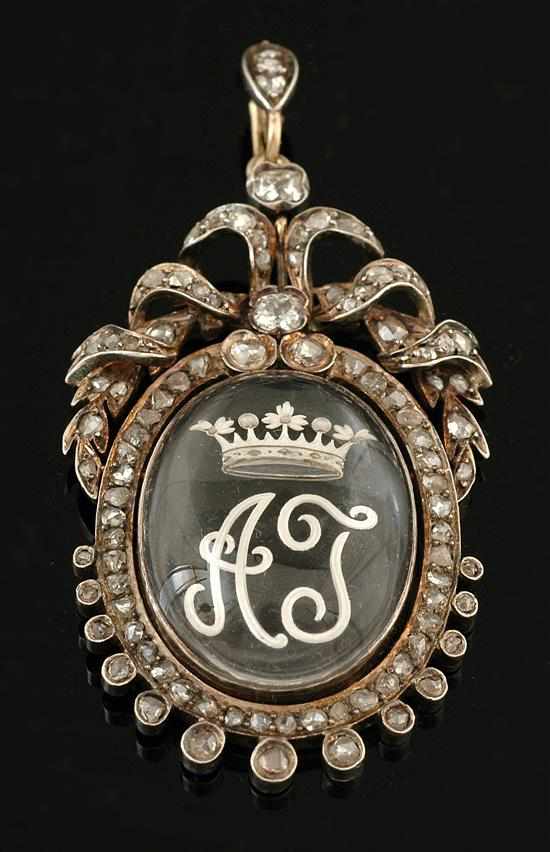 Appraisal: An Antique rock crystal intaglio and diamond pendant The reverse