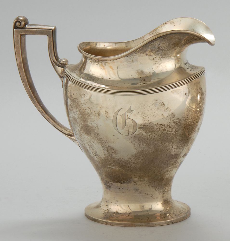 Appraisal: REED BARTON STERLING SILVER PITCHER In urn-form with reeded decoration