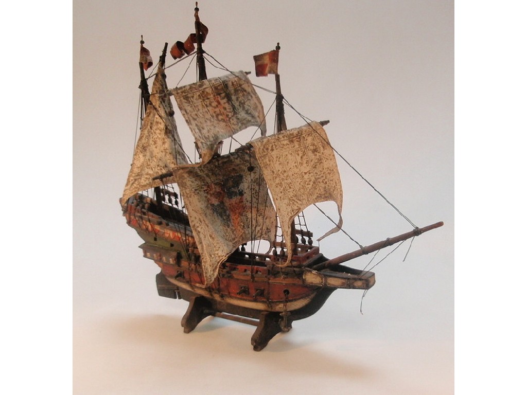 Appraisal: A model of a three mast gunboat cm long