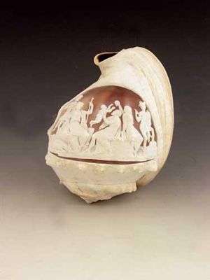 Appraisal: An Italian carved cameo conch shell depicting a group of