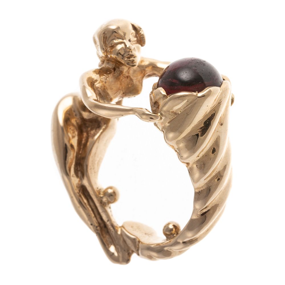 Appraisal: A K Ring of Woman Form with Garnet K yellow