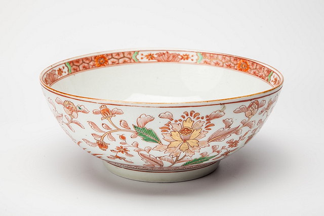 Appraisal: A CHINESE BOWL with iron red chrysanthemum and leaf designs