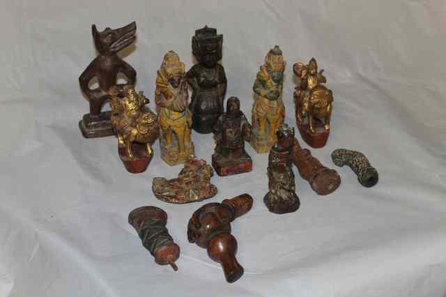 Appraisal: A COLLECTION OF EIGHT CARVED WOOD CHINESE AND OTHER FIGURES