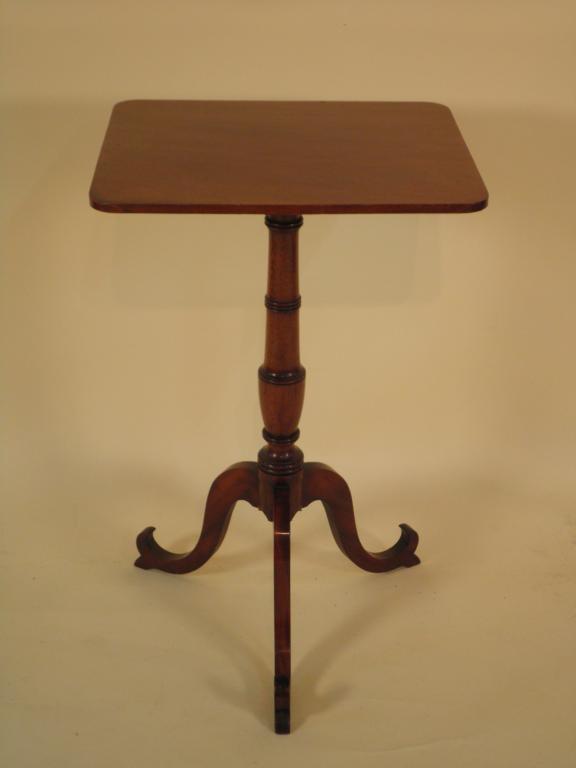 Appraisal: A th C mahogany table the rectangular top on a