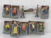 Appraisal: A Britains RAMC stretcher bearer set three painted lead figures