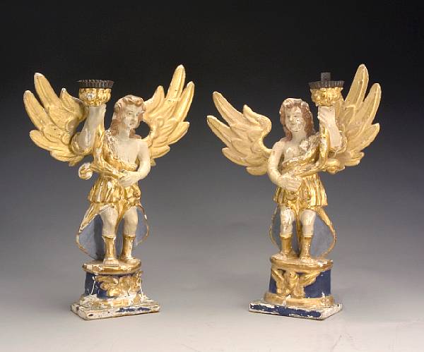 Appraisal: A pair of Italian painted and parcel gilt figures of