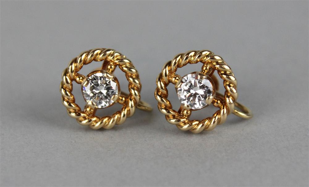 Appraisal: PAIR OF LADY'S K YELLOW GOLD AND DIAMOND EARRINGS fashioned